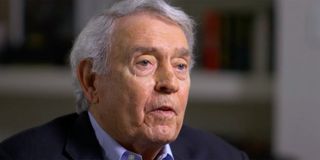 Dan Rather looking at his subject during an interview.