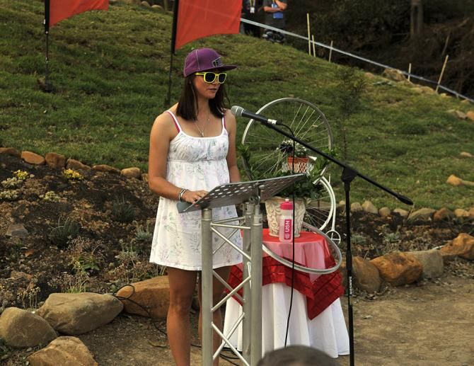 Cherise Stander, the widow of Burry Stander, speaks at the ceremony honouring her husband