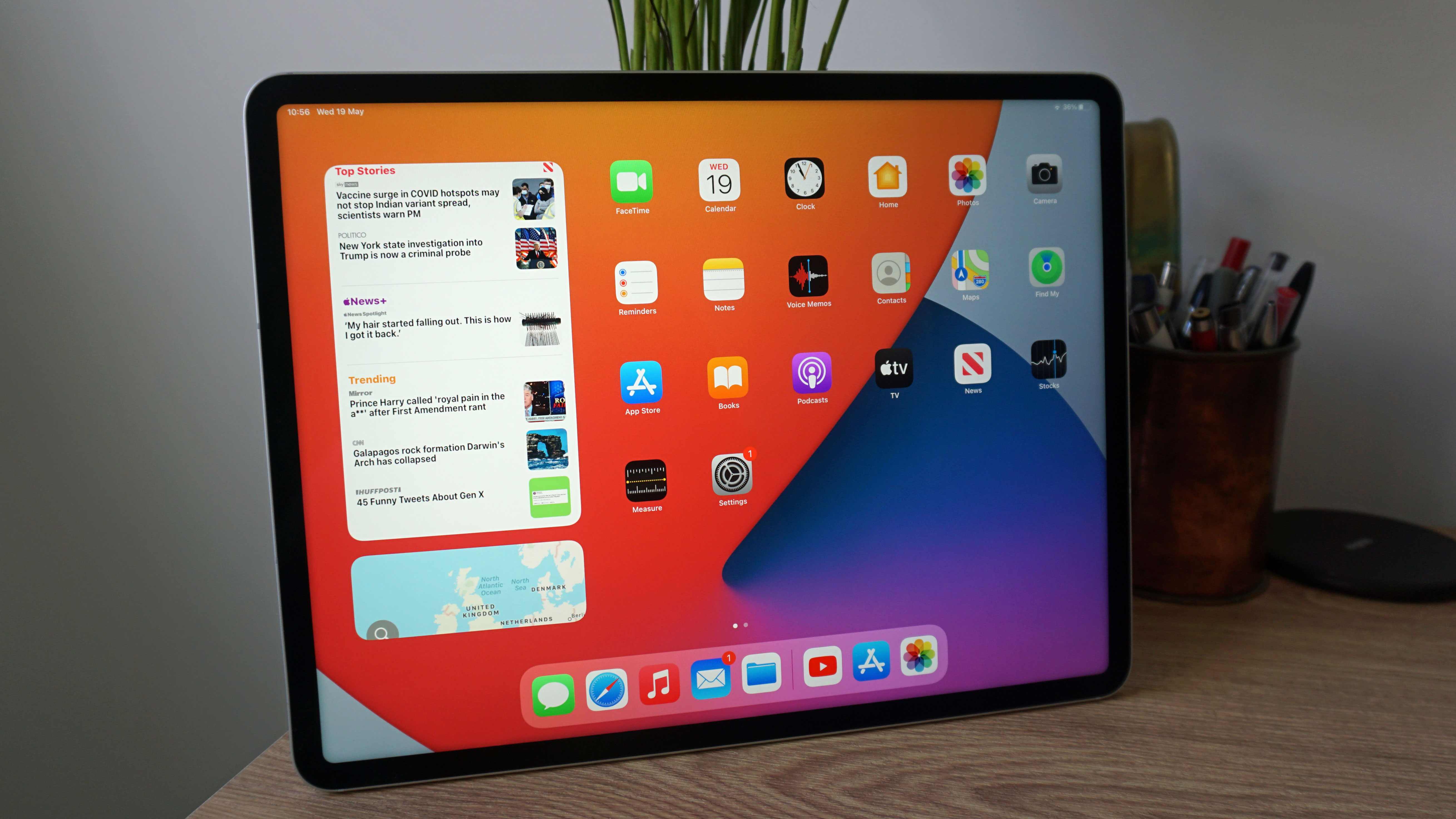 An iPad Pro 12.9 2021 on a table, with the screen on