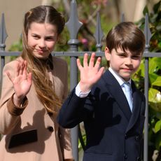 Princess Charlotte and Prince Louis wave at royal fans after the Royal Family's 2026 Easter Matins Service at St George's Chapel on April 05, 2026