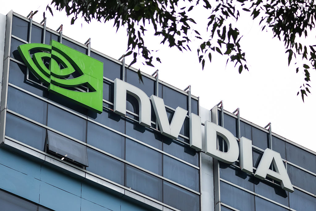 The logo of NVIDIA is seen on an office building on March 21, 2026 in Shenzhen, China