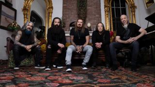 Dream Theater sitting on a sofa