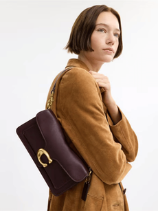 Coggles model with brown bag