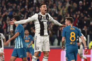 Cristiano Ronaldo of Juventus celebrates after scoring the opening goal during the UEFA Champions League Round of 16 Second Leg match between Juventus and Club de Atletico Madrid at Allianz Stadium on March 12, 2019 in Turin, Italy.