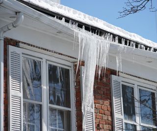 Icicles breaking a gutter