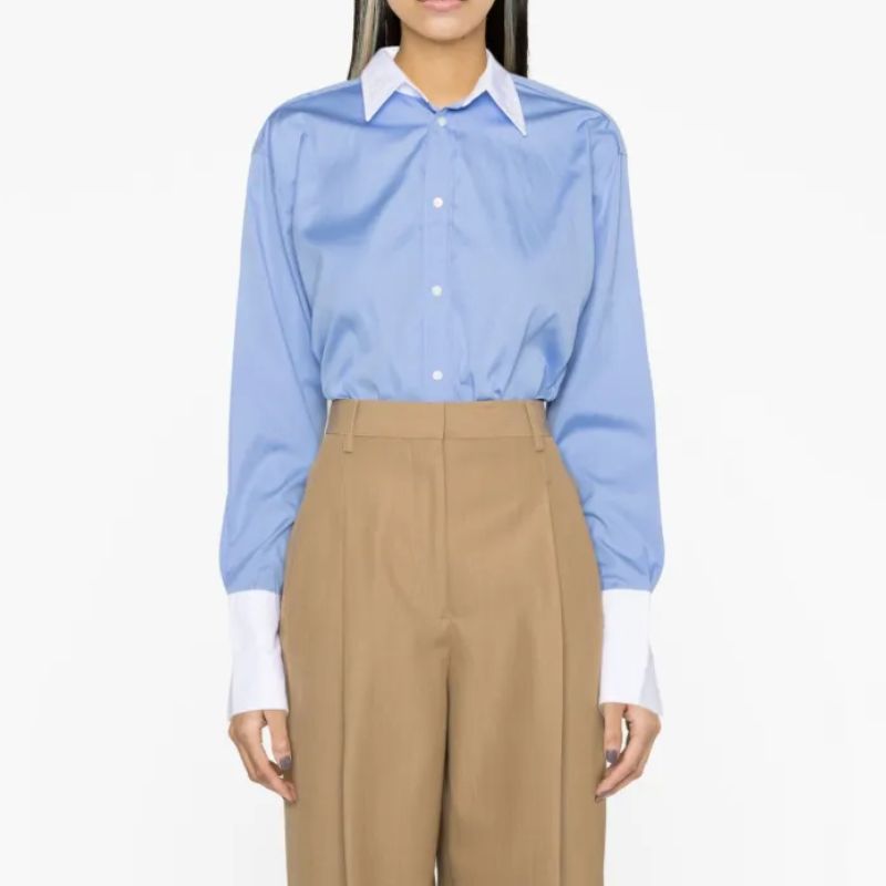 blue shirt with white collar and cuffs