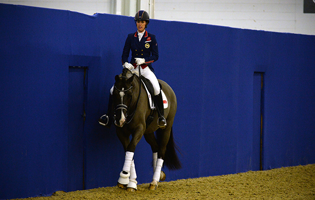 Charlotte and Valegro warm up back stage ahead of their last ever performance of their gold medal-winning London 2012 freestyle