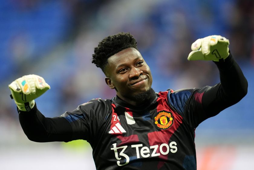 Manchester United goalkeeper Andre Onana warms up ahead of the Europa League match against Lyon in Lyon, France on 10 April, 2025.