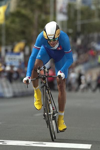 Vladimir Gusev from Russia crosses the line to complete his 45.6km ride against the clock.