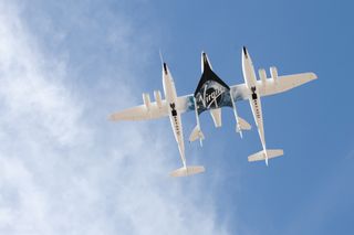 WhiteKnightTwo and VSS Enterprise Fly over the Spaceport