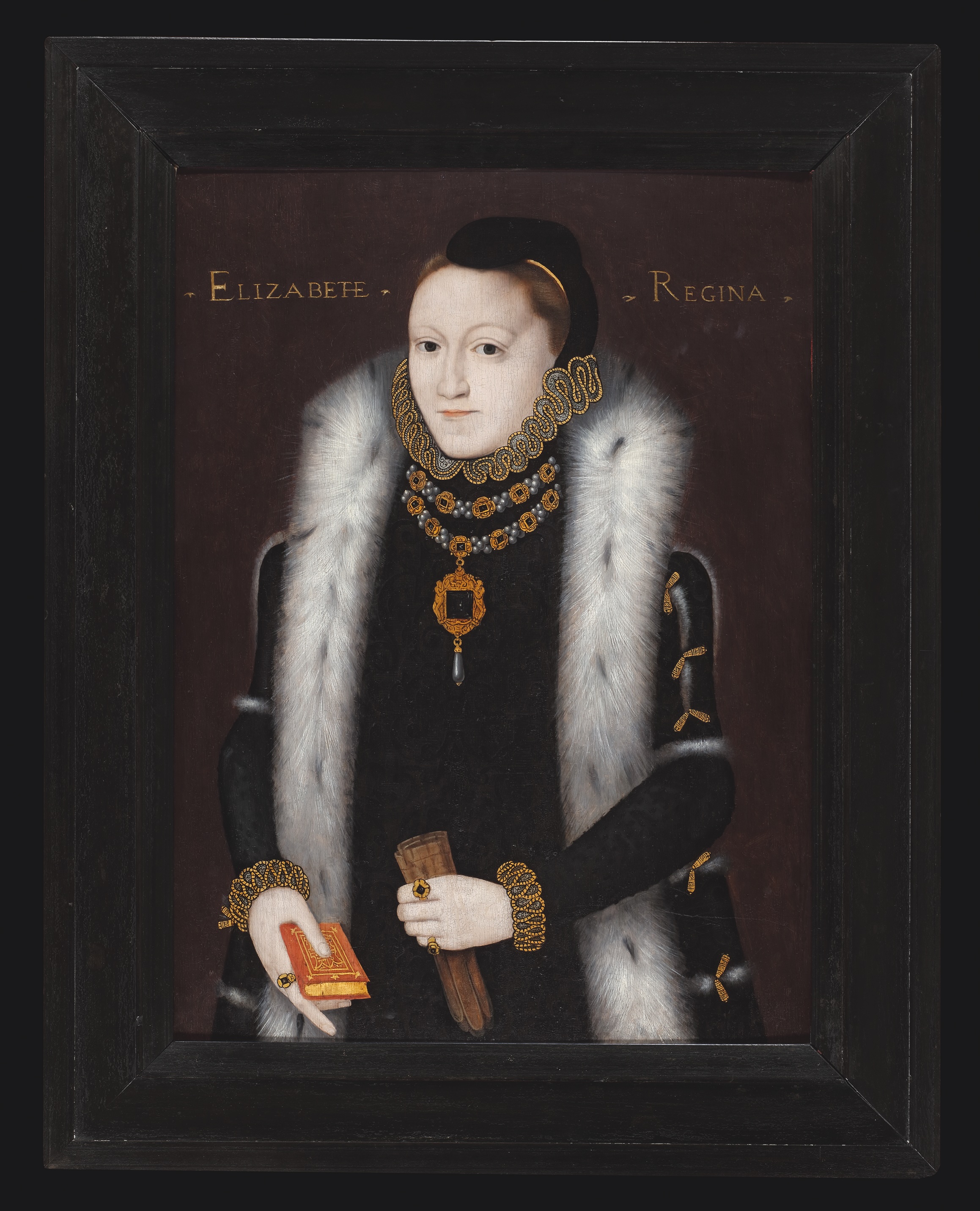 A young Elizabeth I holding a prayer book