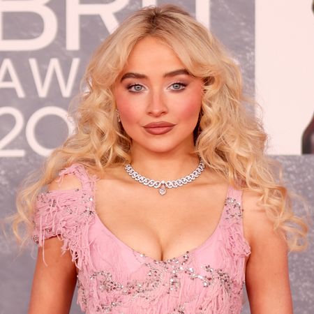 Sabrina Carpenter wears a pink McQueen gown to the BRIT Awards 2025