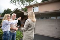 Couple Looking at a New House