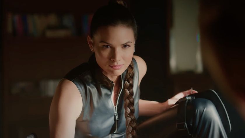 Jessicsa Knight&#039;s Deep Six book counterpart character crouched while wearing black bodysuit on NCIS