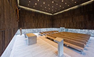 Wooden benches inside chapel