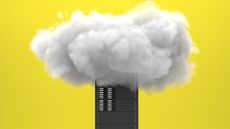 Data center server rack with a plume of cloudy smoke emanating from the top.