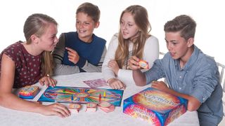 Four children playing Articulate for Kids