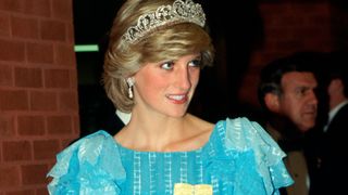ST JOHNS, CANADA - JUNE 18: Diana, Princess Of Wales, Arriving For A Dinner Hosted By The Province Of New Brunswick. The Princess Is Wearing The Diamond Spencer Tiara. She Has Accessorized Her Pale Blue Evening Dress With A Broad Silver Belt And Silver Clutch Bag. Diana's Outfit Is By Fashion Designer Bruce Oldfield.