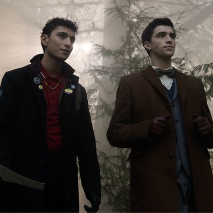 Jayden Revri as Charles Rowland and George Rexstrew as Edwin Payne, standing in a foggy forest, in episode 2 of DEAD BOY DETECTIVES