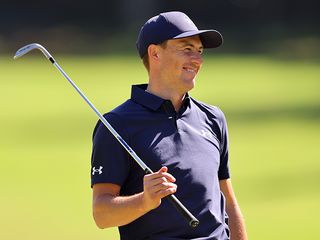 Jordan Spieth laughing on the golf course