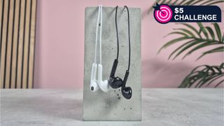 ZJXD wired earbuds on block with words '$5 challenge' positioned in the top right of the image