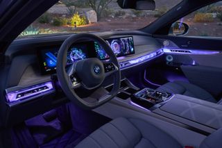 BMW i7 interior and lit-up dashboard