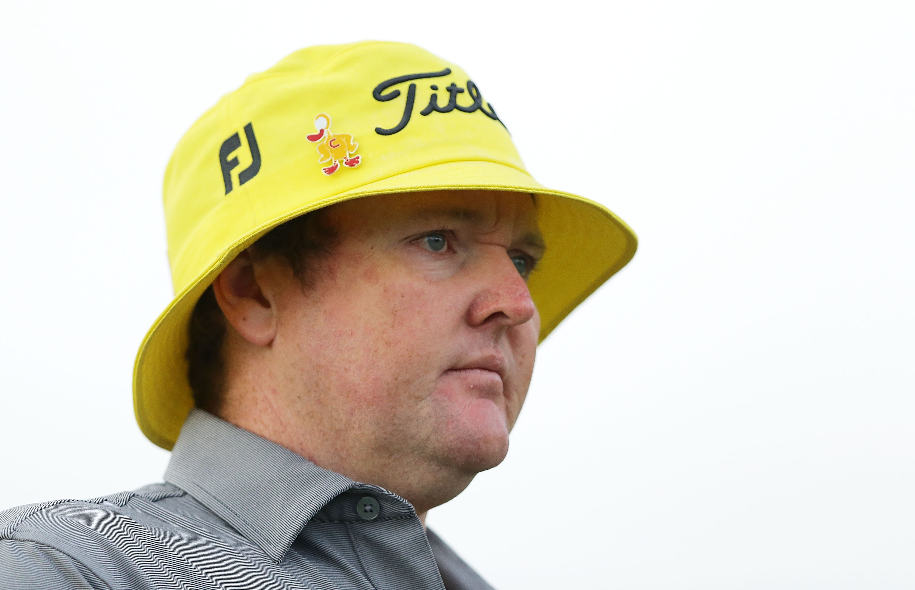 Jarrod Lyle wearing a yellow Titleist bucket hat