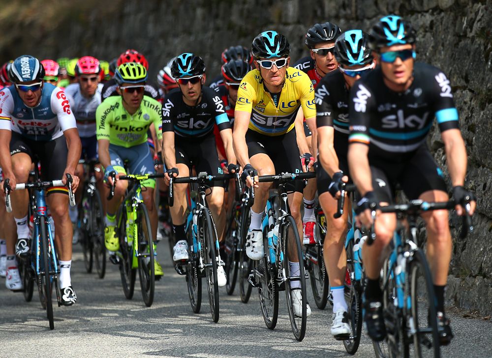 Geraint Thomas surrounded by his team at Paris-Nice.