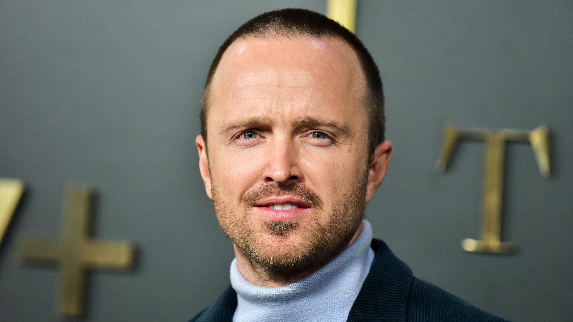 Aaron Paul's modern rustic kitchen features unpainted Homes