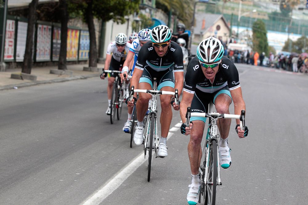 Stuart O' Grady and Fabian Cancellara of Switzerland compete in the 102th edition of the Milan-Sanremo race on March 19, 2011