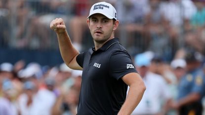 Patrick Cantlay reacts after his 46ft putt at the 18th in the 2022 BMW Championship