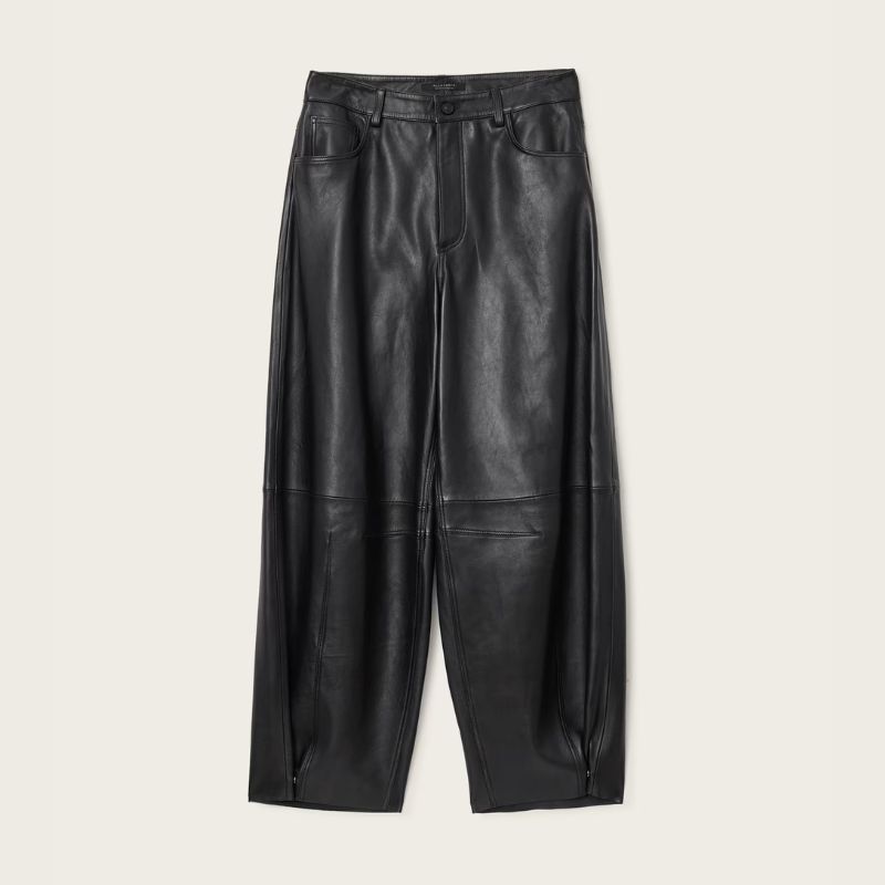 A cutout of black barrel leg leather trousers by All Saints