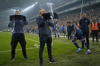 Shields are held up to protect Neymar in Paris St Germain's 0-0 draw at Marseille (Daniel Cole/AP).