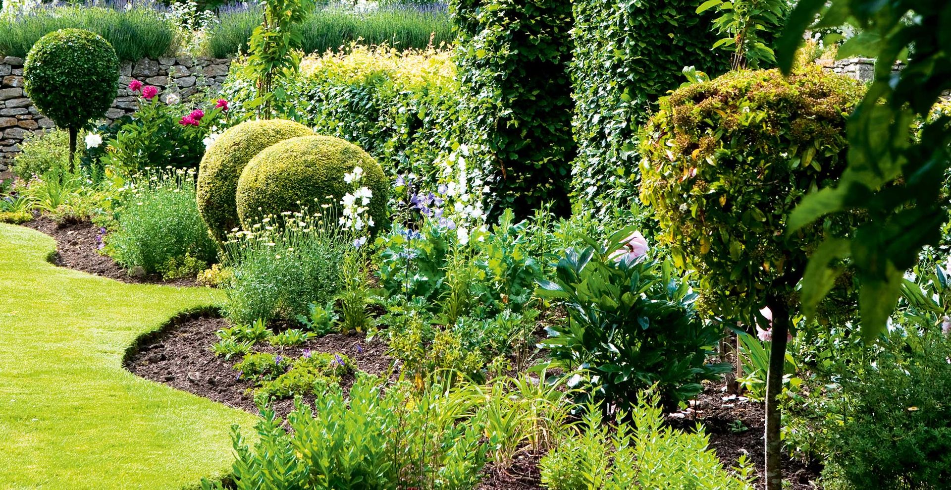 Sustainable garden idea with trees incorporated into the planting