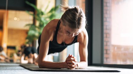a woman doing a plank 
