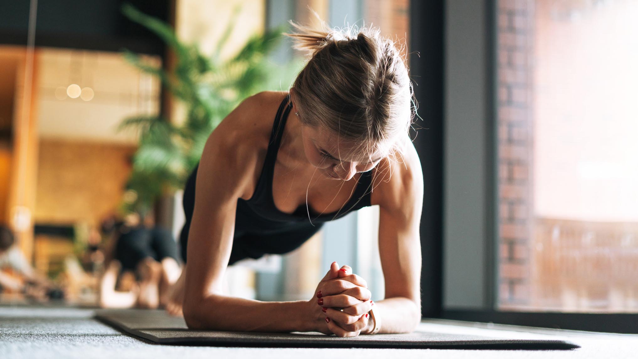 a woman doing a plank 