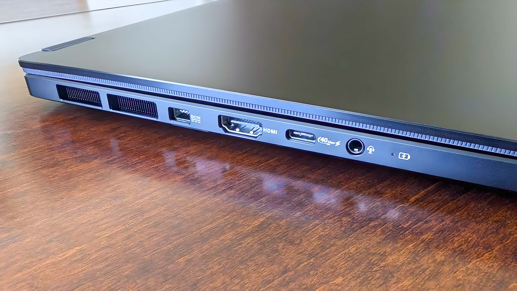 This clever 3K OLED laptop with RTX 4060 graphics builds a unique dial right into the touchpad — but a divisive design choice leaves users like me at a disadvantage