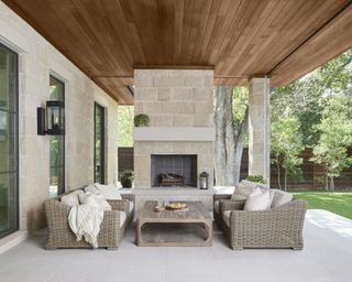 outdoor seating area with gray furniture and wooden roof