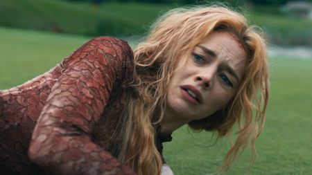 Grace in Ready or Not 2 looking scared and tired in a bloody dress. 