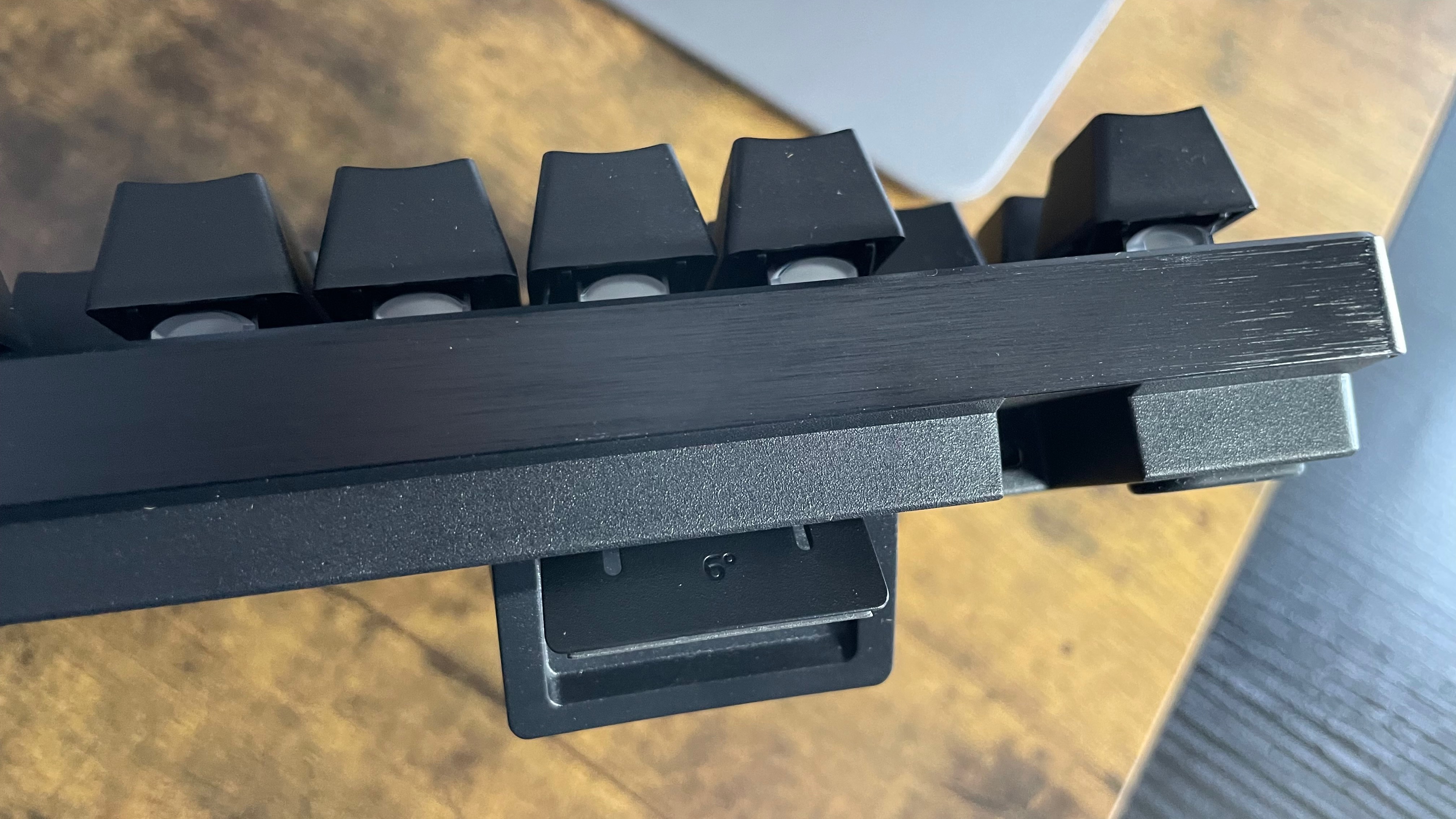 Back of the Razer Huntsman V3 Pro keyboard showing the two-stage adjustable feet.