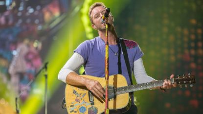 san diego, ca october 08 musician chris martin of coldplay performs on stage at sdccu stadium on october 8, 2017 in san diego, california photo by daniel knightongetty images