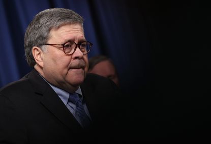 William Barr during a press conference