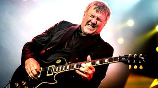 Alex Lifeson of Rush performs on stage at O2 Arena on May 24, 2013 in London, England.