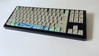 The Drop CSTM80 mechanical keyboard with custom multi-colored keycaps installed