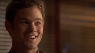 Aaron Ashmore as Jimmy Olsen smiling on Smallville