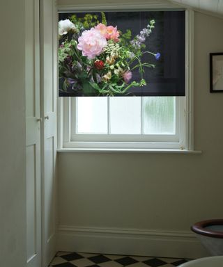 Small bathroom with window blind featuring dramatic dark floral design