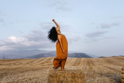 A woman using dance for happiness