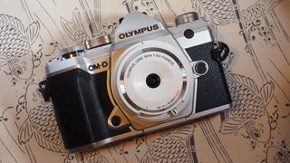 Olympus 9mm f/8 Fisheye Body Cap lens