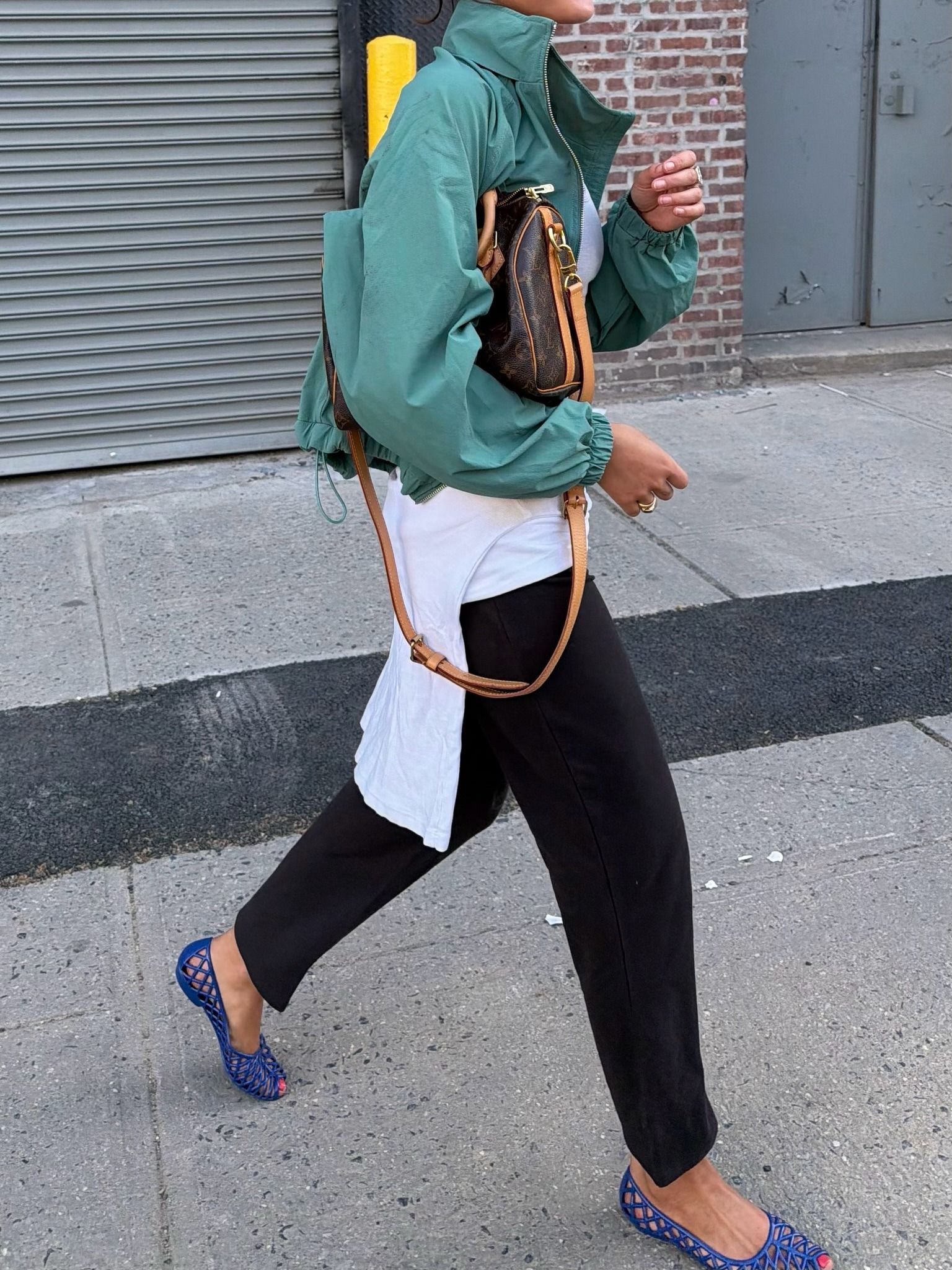 Gen Z influencer wearing summer 2026 microtrend, a pair of lattice jelly ballet flats.