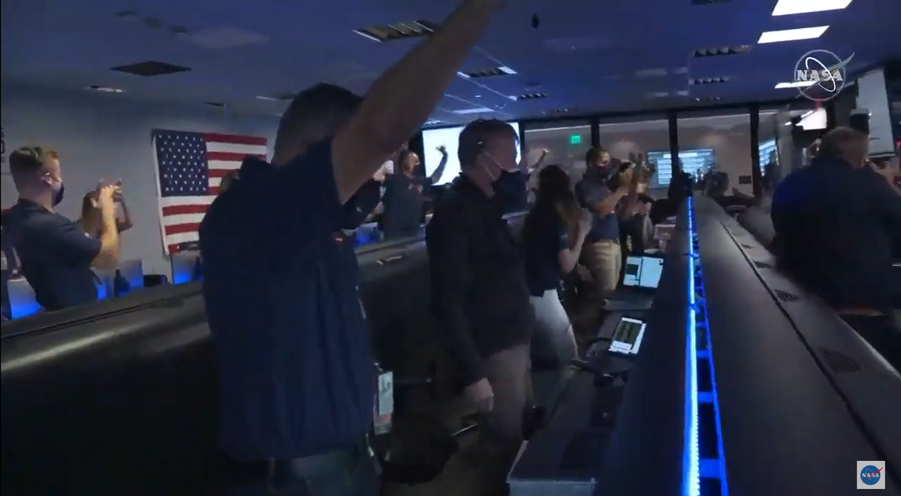 The Perseverance mission control room celebrates the rover's touchdown on Feb. 18, 2021.